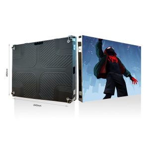 A snowboarder performing a jump against a snowy backdrop with a blue sky.