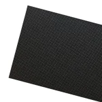 Black sheet featuring a textured surface with a pattern of small dots.