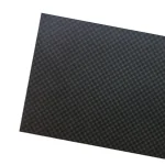 Close-up of a black textured sheet material with a grid pattern.