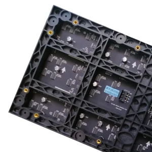 Black circuit board featuring multiple electronic components and connectors arranged in a grid pattern.