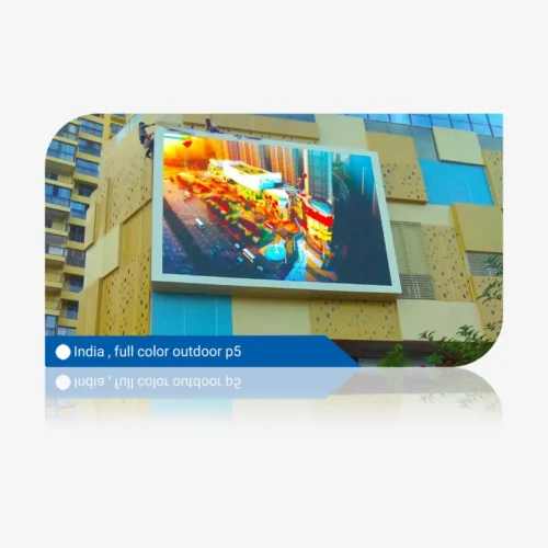 Large full color outdoor LED display mounted on a building in India.