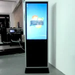 Digital kiosk featuring a large touchscreen display and a sleek design.