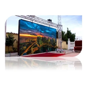 Large outdoor LED display screen showing a city skyline at dusk with lights reflecting on water.