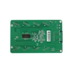 Green printed circuit board with various electronic components and connections.