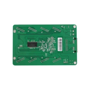 Green printed circuit board with various electronic components and connections.