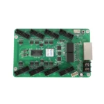 Green circuit board featuring various connectors and electronic components.