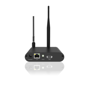 Wireless media streaming device with HDMI, LAN, and audio ports on the back.