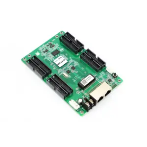 Green circuit board featuring multiple connectors and a network port.