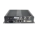 Black electronic device featuring various ports including UART, audio, and DVI connections on the back panel.