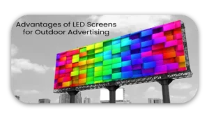 Large LED screen billboard displaying a vibrant, multicolored pattern against a city skyline.