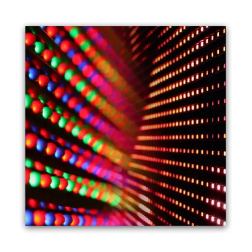 Abstract image of colorful LED lights in red, green, and blue patterns on a dark background.